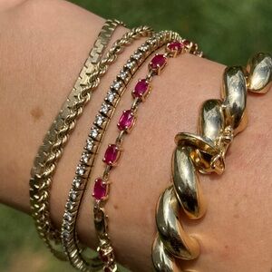 10k gold tennis bracelet with synthetic rubies 7.5”